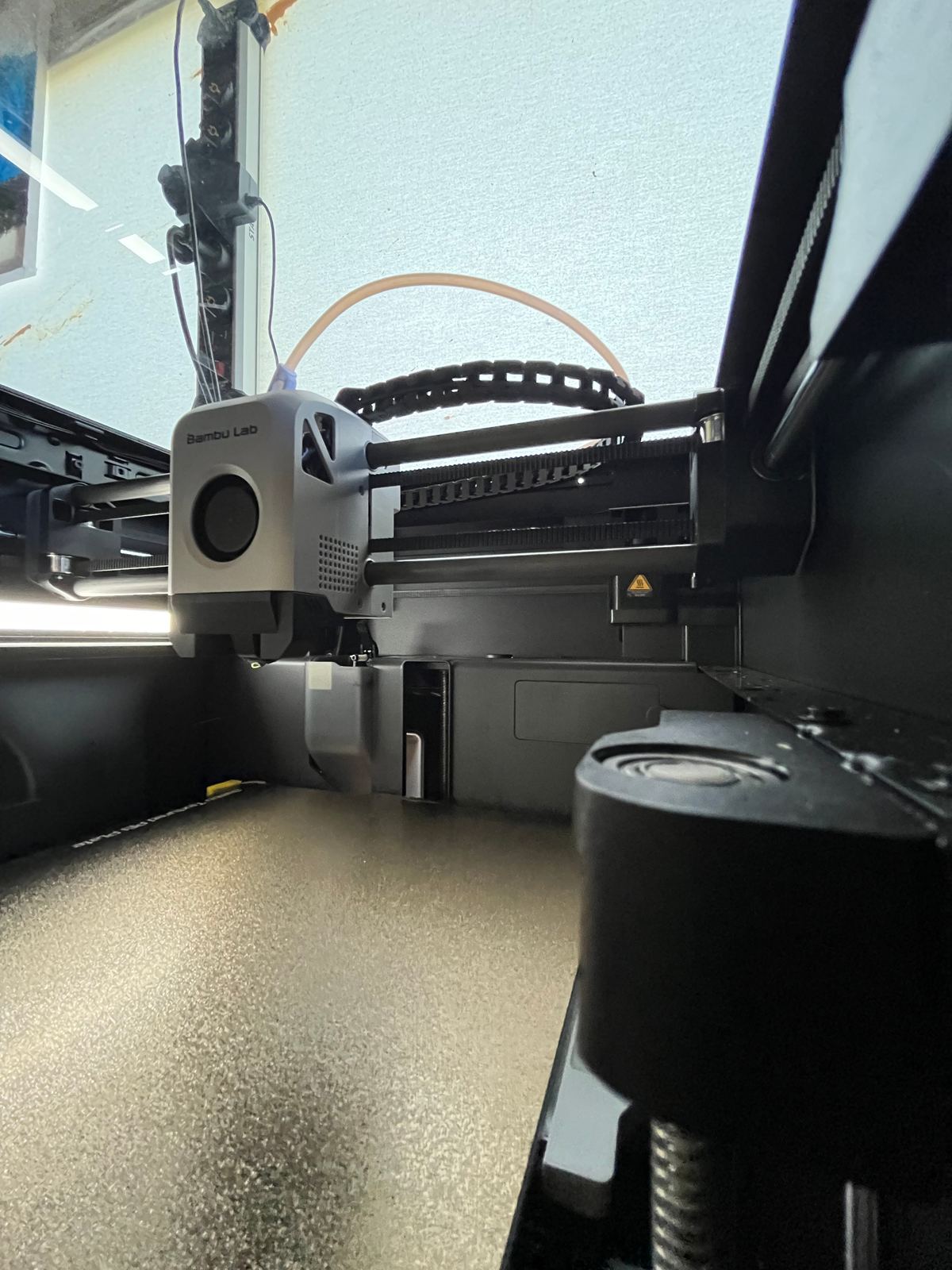 A finished 3D printed part fresh off the print bed