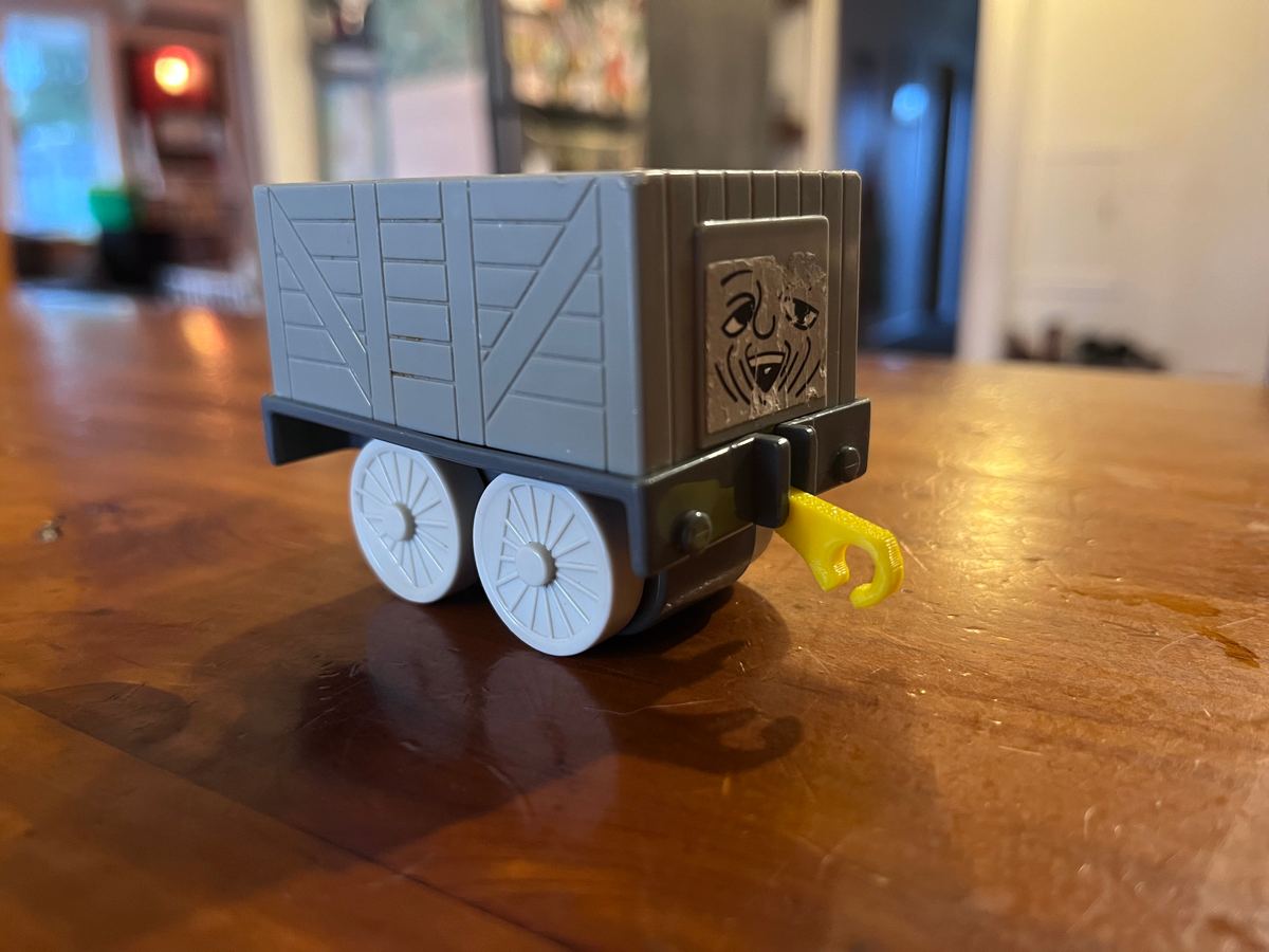 Replacement ride-on railcar hook, 3D printed for a toy library