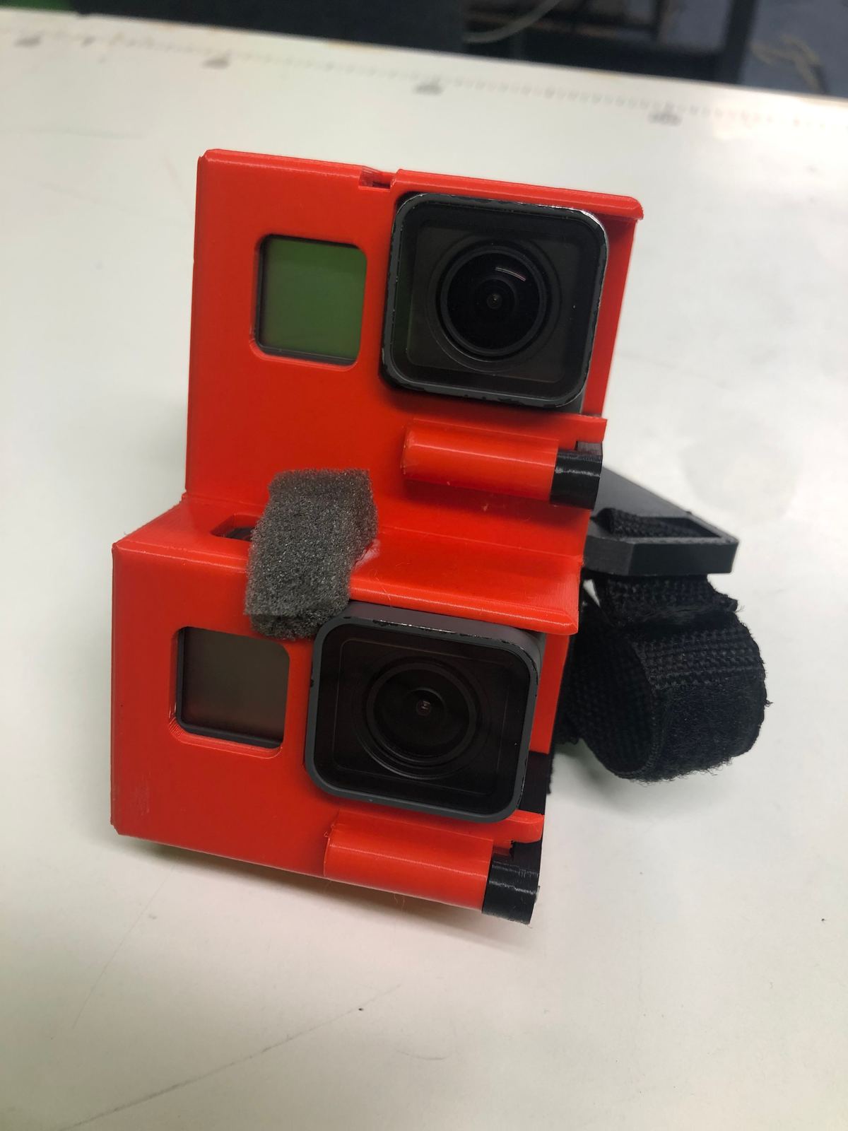 A Wristy handycam glove in red