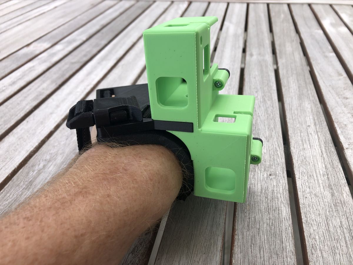 A Wristy Handycam Glove in Black and green