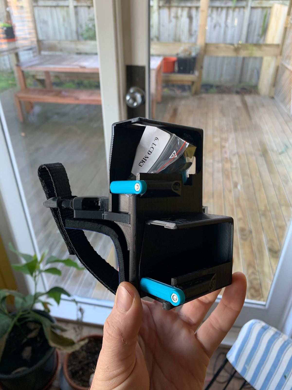 A Wristy Handycam glove in black and blue