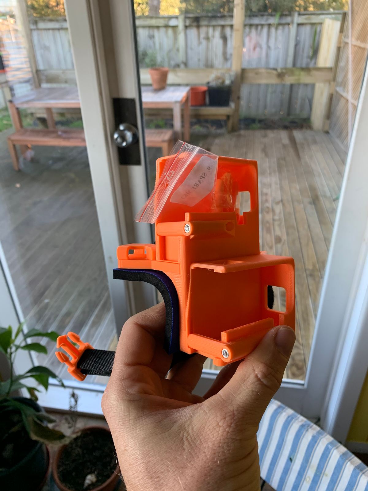 A Wristy Handycam Glove in Orange